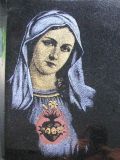 Grawer Maryji na nagrobku w kolorze