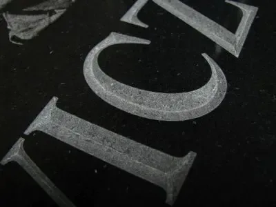 Chiseled Grave Letter in Granite — Hand Carved Stonemason Craft