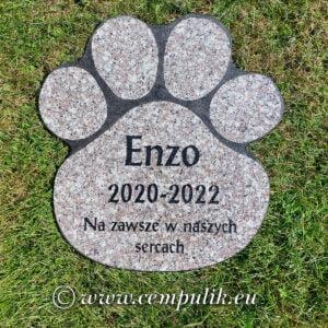 brazowy nagrobek w kształcie łapy