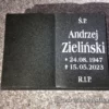 ksiażka czarna granitowa z napisem